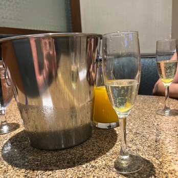 Avenue Cafe - Mimosas. A bottle is very decently priced here! $27 - Bars Near Me - Las Vegas, Nevada