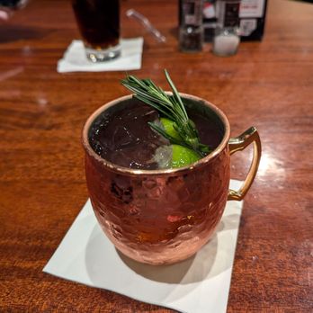 Stonewood Grill & Tavern - Rosemary Cranberry Mule. My go to drink. This place unlocked my love for Mules! - New American Near Me - Ormond Beach, Florida