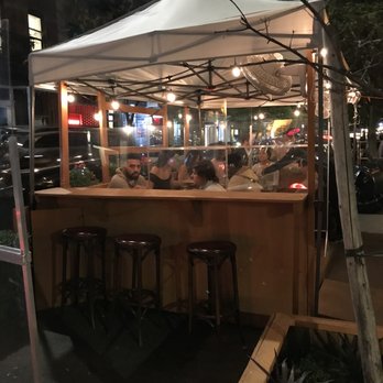 Rubirosa - Outdoor dining area - Italian Near Me - New York, New York Rubirosa - Outdoor dining area - Italian Near Me - New York, New York