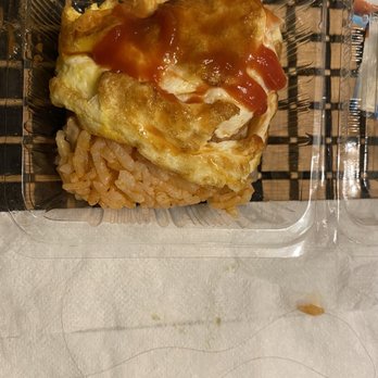 KuruKuru Sushi - Omurice. Next to the container on the napkin is the piece of long hair I found in my rice. - Sushi Bars Near Me - Honolulu, Hawaii KuruKuru Sushi - Omurice. Next to the container on the napkin is the piece of long hair I found in my rice. - Sushi Bars Near Me - Honolulu, Hawaii
