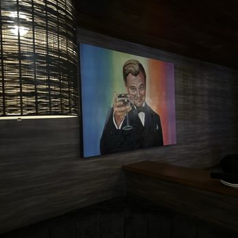 Delaney's Tavern - Booth seating  wall art - New American Near Me - Orlando, Florida