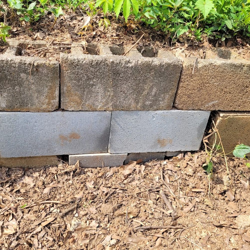 Gunnison Tree Services - Neighbors retaining wall repair photo final repair closeup - Tree Services Near Me - Atlanta, Georgia Gunnison Tree Services - Neighbors retaining wall repair photo final repair closeup - Tree Services Near Me - Atlanta, Georgia