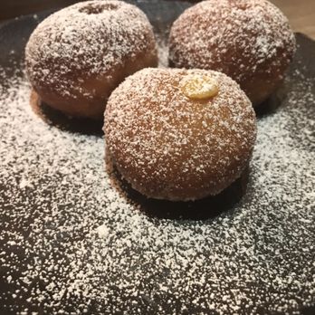 Sparrow + Wolf - Beignets filled with a sweet & sour lemon curd - New American Near Me - Las Vegas, Nevada Sparrow + Wolf - Beignets filled with a sweet & sour lemon curd - New American Near Me - Las Vegas, Nevada