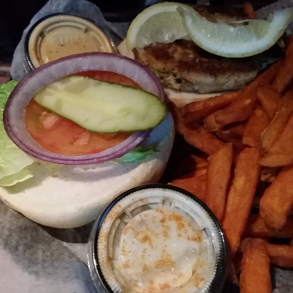 Coconuts On The Beach - Sweet potato fries and crabcake sandwich - Bars Near Me - Cocoa Beach, Florida