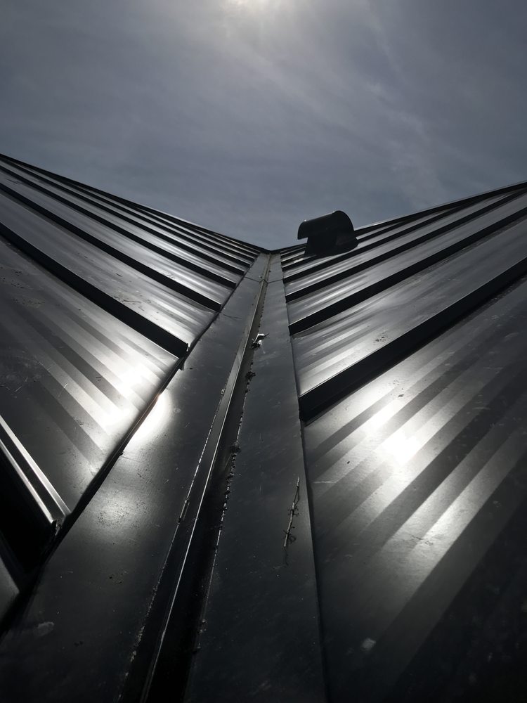 Slide of Hickman Metal Roofing