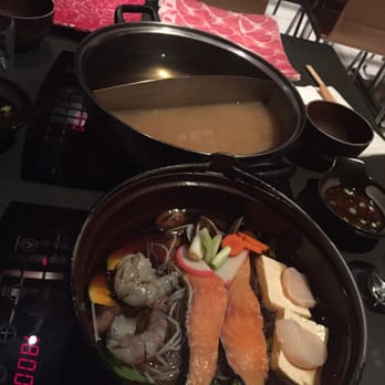 Nabe - Seafood hit pot and 2 shabu shabu's with beef and pork in the background - Hot Pot Near Me - San Francisco, California Nabe - Seafood hit pot and 2 shabu shabu's with beef and pork in the background - Hot Pot Near Me - San Francisco, California