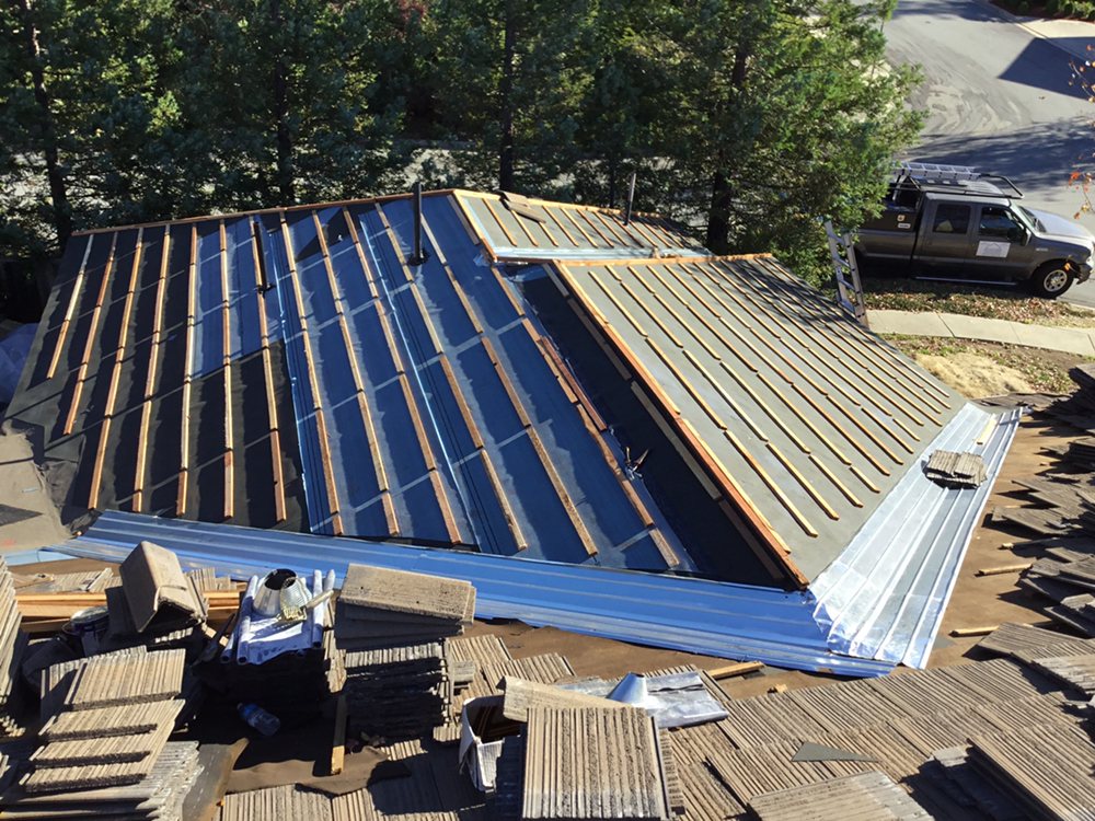 Slide of Pro Roofing