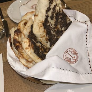 Tamba - Tandoori Bread Basket: Black Truffle Naan, Goat Cheese Naan, Garlic Cilantro Naan, & Plain Naan - Indian Near Me - Las Vegas, Nevada Tamba - Tandoori Bread Basket: Black Truffle Naan, Goat Cheese Naan, Garlic Cilantro Naan, & Plain Naan - Indian Near Me - Las Vegas, Nevada