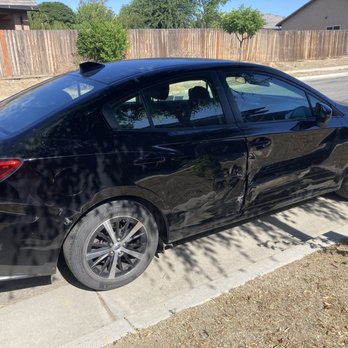 Caliber Collision - The right back door still doesn't look right - Body Shops Near Me - Bakersfield, California Caliber Collision - The right back door still doesn't look right - Body Shops Near Me - Bakersfield, California