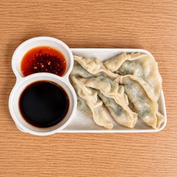 Mian - Crispy bottoms, juicy bites!  Pork & chive potstickers bursting with flavor--right here at Mian Honolulu.