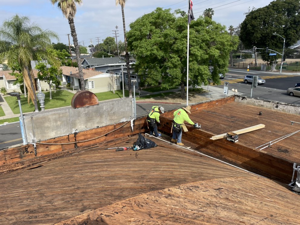 Slide of New Village Roofing