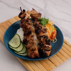 Baryo - Pork skewers marinated in a blend of oyster sauce, lime juice, lime leaf, coriander root, and seasonings.