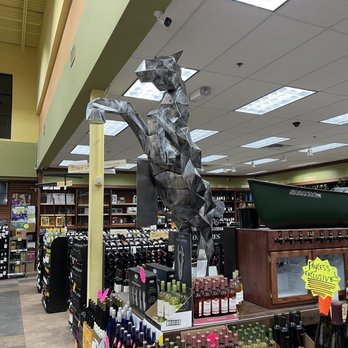 Payless Liquors - a man riding a horse in a store - Beer, Wine & Spirits Near Me - Carmel, Indiana Payless Liquors - a man riding a horse in a store - Beer, Wine & Spirits Near Me - Carmel, Indiana