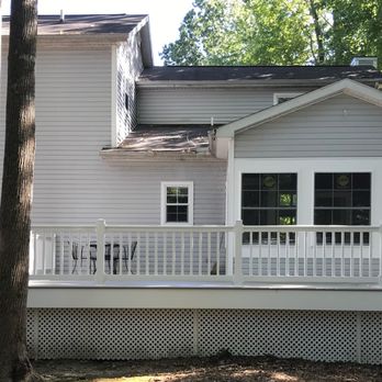 Covenant Contractors - Sunroom enclosure and new composite decking with vinyl rail. - General Contractors Near Me Covenant Contractors - Sunroom enclosure and new composite decking with vinyl rail. - General Contractors Near Me