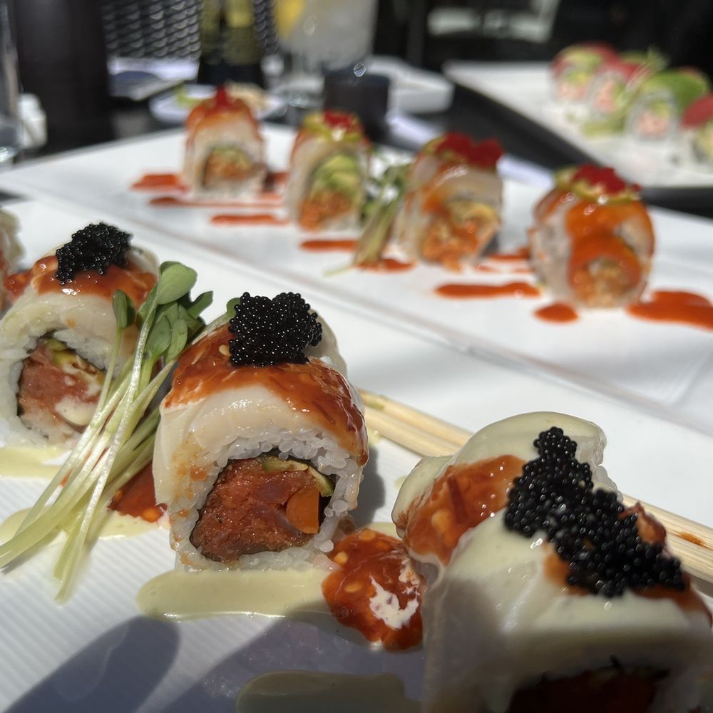 Tadashi - Voodoo roll (topped with escolar) and Fire Angel roll. - Sushi Bars Near Me - Bee Cave, Texas Tadashi - Voodoo roll (topped with escolar) and Fire Angel roll. - Sushi Bars Near Me - Bee Cave, Texas