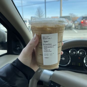 Starbucks - Grande cold brew, 1 pump cinnamon dolce, 1 pump, white mocha, 1 stevia, Lt. cream 1/4, and cinnamon powder. - Coffee & Tea Near Me - Belton, Missouri