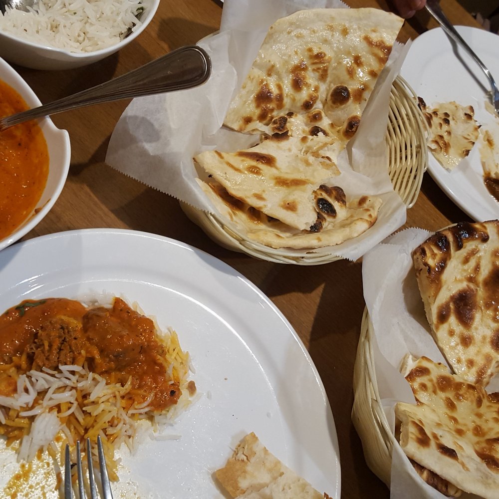 Koyla - Lamb tikka masala (medium) and vegetable curry(Indian spicy) with goat cheese naan and plain naan. Everything very good :) - Indian Near Me - Allen, Texas