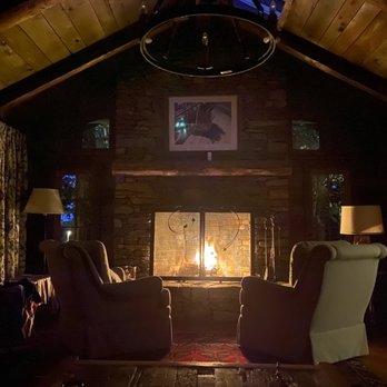 The Swag - a cozy living room with a fireplace - Hotels Near Me - Waynesville, North Carolina