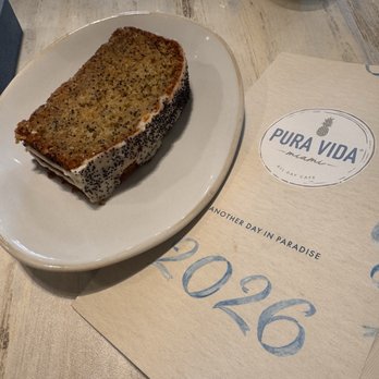 Pura Vida Miami - VEGAN ORANGE POPPY SEED LOAF - Breakfast & Brunch Near Me - Delray Beach, Florida Pura Vida Miami - VEGAN ORANGE POPPY SEED LOAF - Breakfast & Brunch Near Me - Delray Beach, Florida