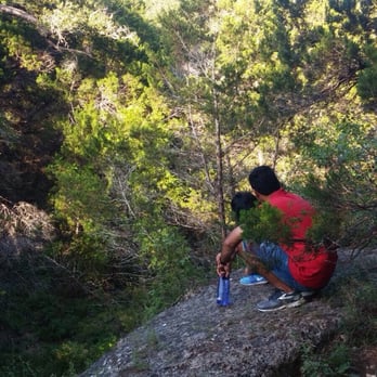 Emma Long Park Turkey Creek Trail - Wild ledge overlooking the water stream beneath - Hiking Near Me - Austin, Texas