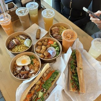 Saiga Vietnamese Eatery - Pork Belly Banh Mi Pork Belly Banh Mi Garlic Noodles with BBQ Chicken Tofu Vermicelli with Eggroll Vietnamese Coffee Lychee Green Tea - Vietnamese Near Me - Orange, California