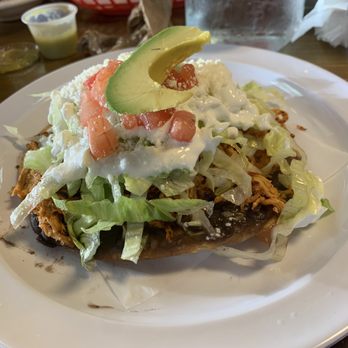 Michelada House II - Tostada with lettuce, crema, avocado, tinga de pollo and black bean spread on bottom... totally delicious - Mexican Near Me - Jackson Heights, New York Michelada House II - Tostada with lettuce, crema, avocado, tinga de pollo and black bean spread on bottom... totally delicious - Mexican Near Me - Jackson Heights, New York