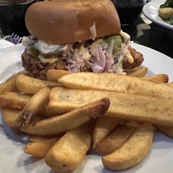 Tustin Brewing - Full shot of the sandwich showing the steak fries - Breweries Near Me - Tustin, California Tustin Brewing - Full shot of the sandwich showing the steak fries - Breweries Near Me - Tustin, California