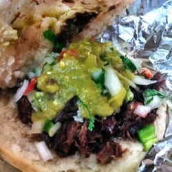 Northland Shell - Handmade gordita with barbacoa, pico, and verde sauce. From a gas station.