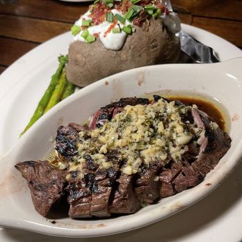 Chart House Waikiki - Joey's Famous Garlic Prime Steak 9oz Marinated Beef Tenderloin. Charbroiled then sauceed in garlic and butter - Steakhouses Near Me - Honolulu, Hawaii