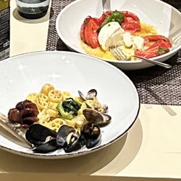 Seafood pasta special, mozzarella salad Seafood pasta special, mozzarella salad