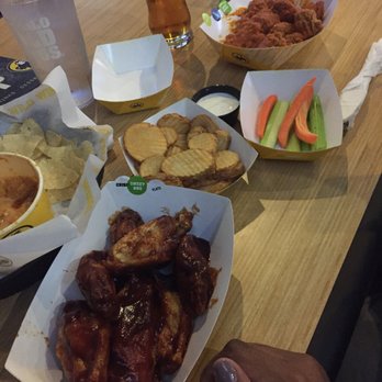 Buffalo Wild Wings - But is all this sauce necessary? The sauce should enhance the flavor, not overpower the wing itself. - American Near Me - Gastonia, North Carolina