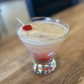 Between The Bun - a drink with a cherry garnish - American Near Me - North Ridgeville, Ohio Between The Bun - a drink with a cherry garnish - American Near Me - North Ridgeville, Ohio