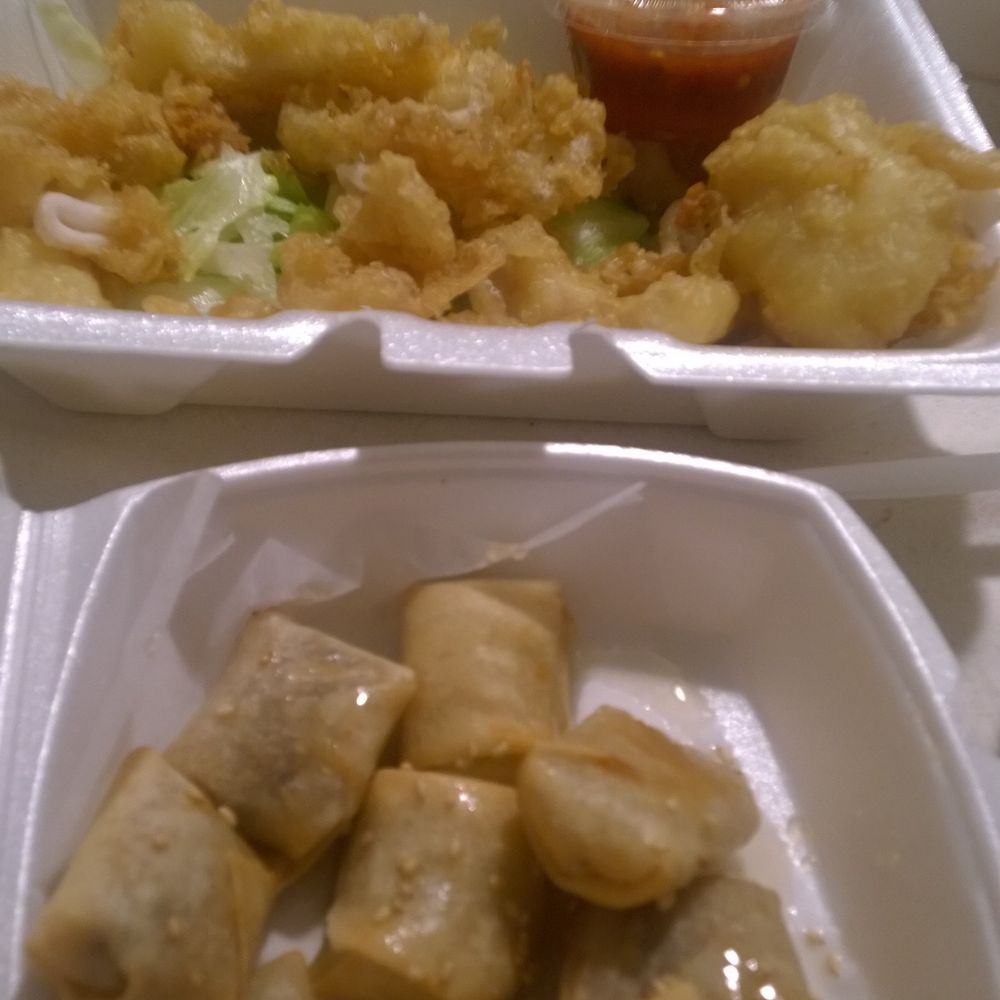 Divine Thai - Calamari and fried bananas. The calamari sauce is chili oil esque. Bananas have honey and sesame seeds. - Thai Near Me - Northbridge, Massachusetts Divine Thai - Calamari and fried bananas. The calamari sauce is chili oil esque. Bananas have honey and sesame seeds. - Thai Near Me - Northbridge, Massachusetts
