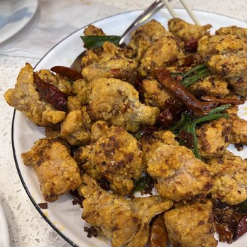 Peking Man Restaurant - Spicy crispy chicken. Delicious!!!!! Crispy but not too doughy. Slight spice. Careful eating because some pieces have bones. - Dim Sum Near Me - Markham, Ontario Peking Man Restaurant - Spicy crispy chicken. Delicious!!!!! Crispy but not too doughy. Slight spice. Careful eating because some pieces have bones. - Dim Sum Near Me - Markham, Ontario