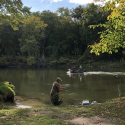 Matson's Big Manistee River Campground - Fisherman along the river.