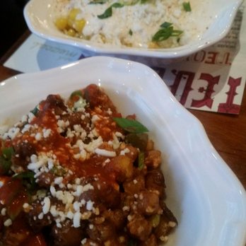 Canteen - Beans with Crispy Rice in front and Street Corn in back - Tacos Near Me - Madison, Wisconsin Canteen - Beans with Crispy Rice in front and Street Corn in back - Tacos Near Me - Madison, Wisconsin