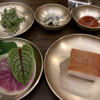 Benu - Pork with inverted crispy skin - chrysanthemum-scallion salad - fresh bracken fern in piquant dressing - tomato meju w/ assorted lettuces - Asian Fusion Near Me - San Francisco, California Benu - Pork with inverted crispy skin - chrysanthemum-scallion salad - fresh bracken fern in piquant dressing - tomato meju w/ assorted lettuces - Asian Fusion Near Me - San Francisco, California