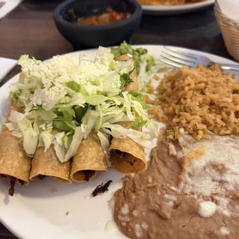 Raul's Casa Sombrero - Four Taquitos, Guacamole, Sour Cream, Rice and Beans Combo. I had the chicken! - Mexican Near Me - Hawthorne, California Raul's Casa Sombrero - Four Taquitos, Guacamole, Sour Cream, Rice and Beans Combo. I had the chicken! - Mexican Near Me - Hawthorne, California