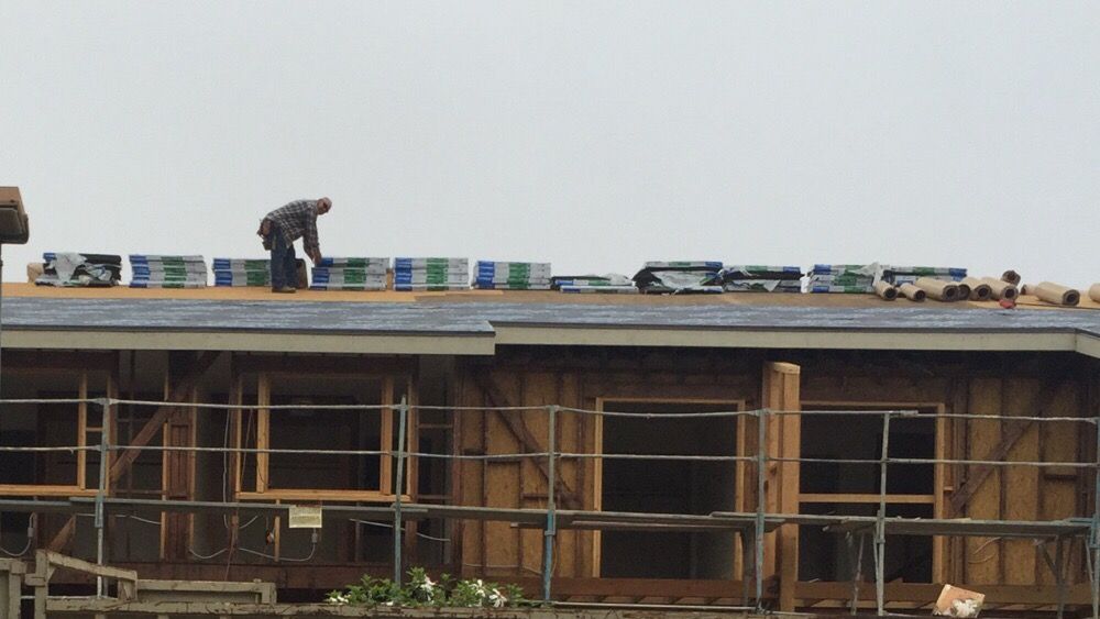 Slide of Precision Roofing