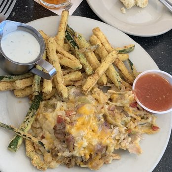The Monument Café - King ranch casserole with side of fried zucchini and ranch to dip - American Near Me - Georgetown, Texas The Monument Café - King ranch casserole with side of fried zucchini and ranch to dip - American Near Me - Georgetown, Texas
