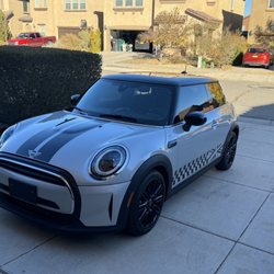 Rosies Window Tinting - Tint and graphics on hood and doors.