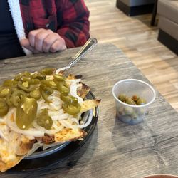 Mexican Fiesta - Small nacho with ground beef & olives on the side
