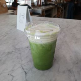 Matcha latte (oat milk) with cream top Matcha latte (oat milk) with cream top