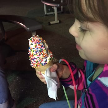 Mr. Cone - a little girl eating an ice cream cone with sprinkles - Fast Food Near Me - Chicopee, Massachusetts