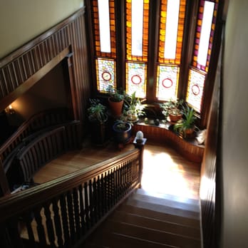 KDK Flooring - a staircase with stained glass windows - Flooring Near Me - Highland, New York KDK Flooring - a staircase with stained glass windows - Flooring Near Me - Highland, New York
