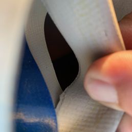 Split seam close up (vert) on Dinghy Doctor used dinghy #2
