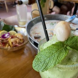 Lychee-ito, with pomelo tuna sashimi salad and tom kaa gai soup behind Lychee-ito, with pomelo tuna sashimi salad and tom kaa gai soup behind
