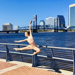 SDJ Dancer showing Joy in front of our city scape!