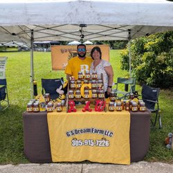Gs Dream Farm - Gloria and her son Roger at the Farmers Market at the Fruit and Spice park located in Homestead, FL