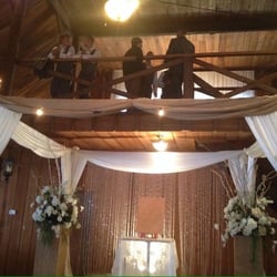 The Barn at Cypress Meadows Plantation wedding and event center - Hanging out @ the bar in the loft.
